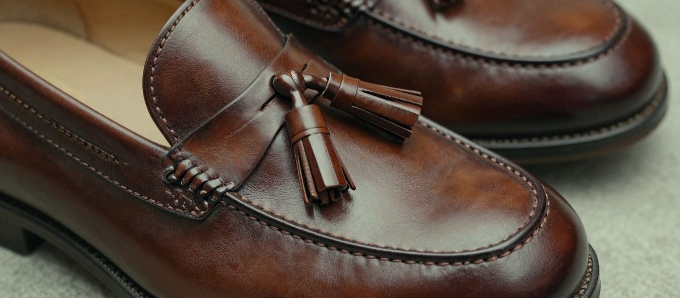 Alden tassel loafers, classic leather dress shoes.