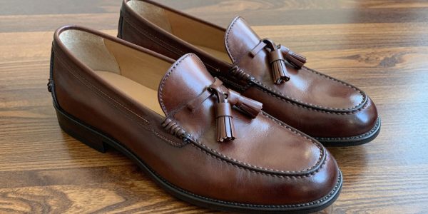 Alden tassel loafers in rich brown leather.
